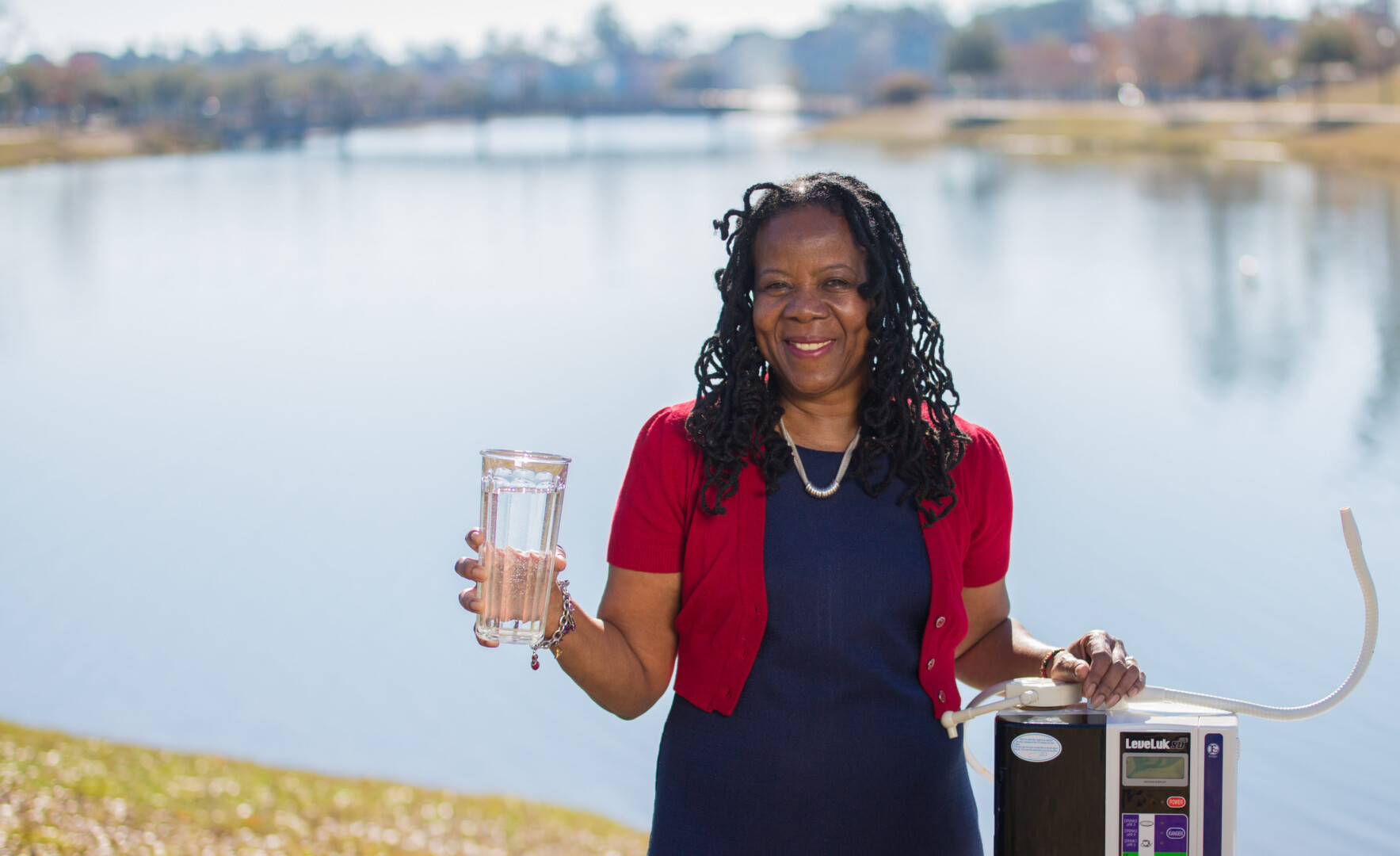 Alsuna Roland, the Grand Strand's Kangen Water respresentative, is being photograpphed at the Market Common.