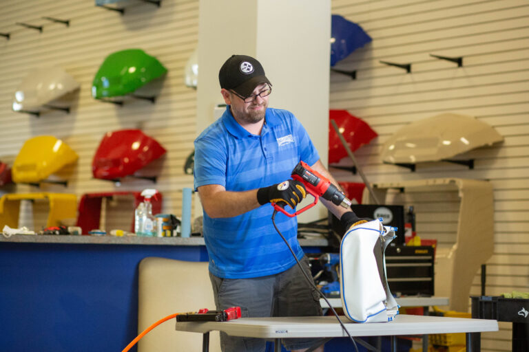 R.J. Hart replaces a golf cart seat